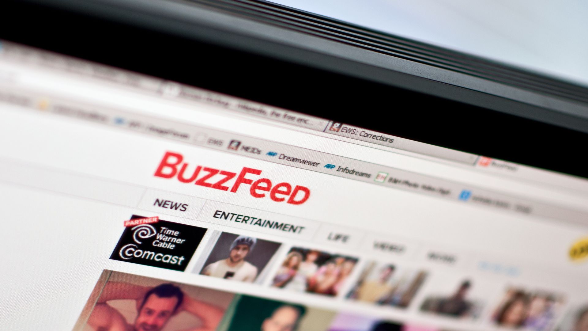 Photo of top of BuzzFeed website on a laptop.