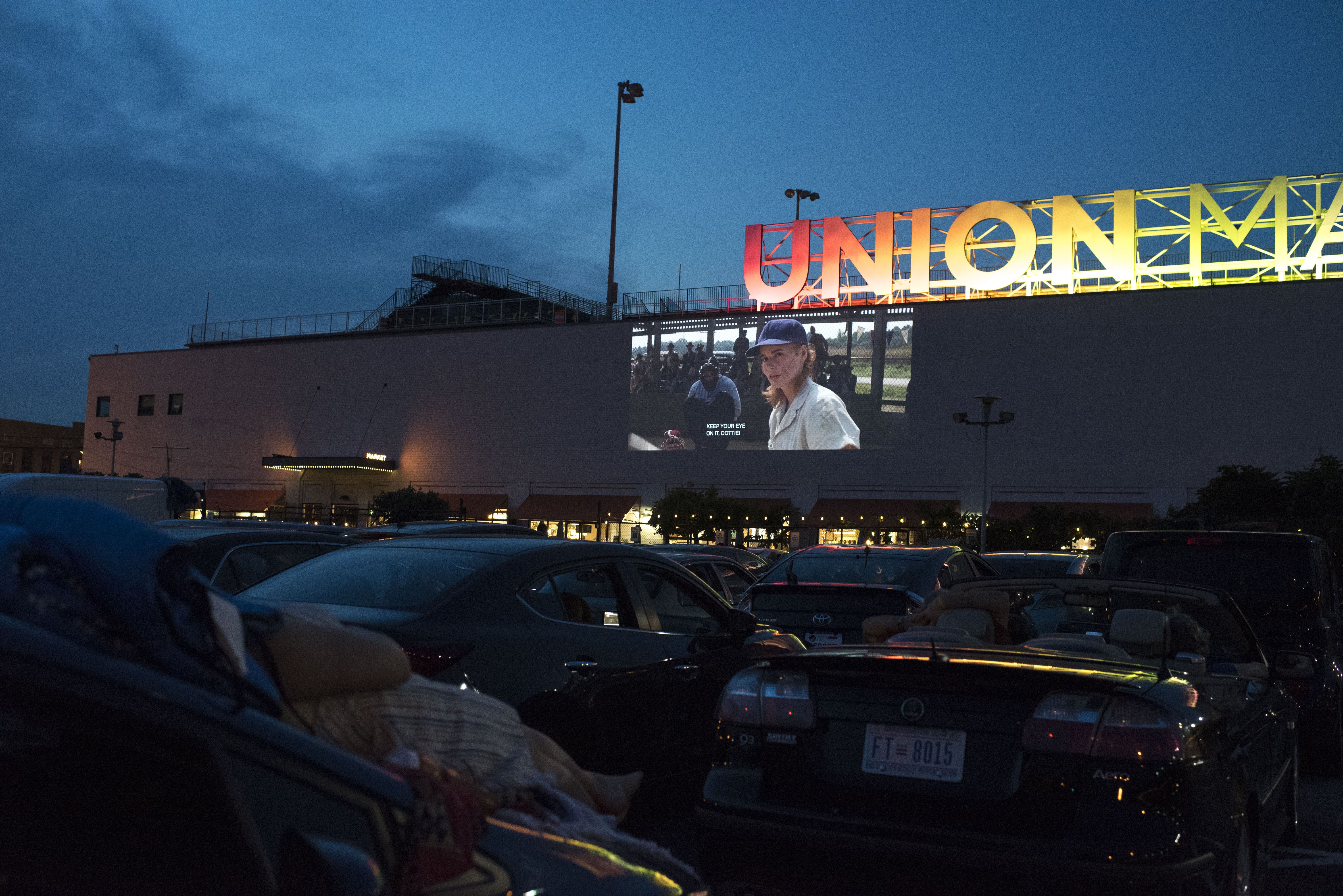 A League of Their Own" plays at a drive-in movie night at Union Market on July 5, 2019 in Washington, DC. (Photo by Marlena Sloss/The Washington Post via Getty Images)