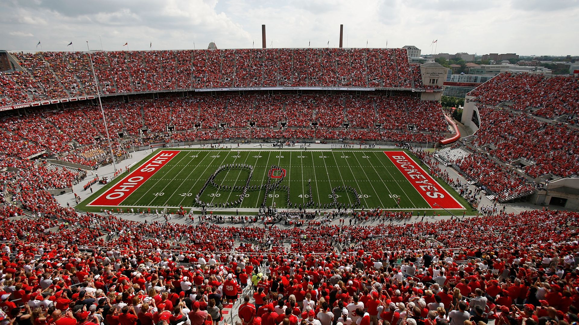 An aerial shot of Ohio Stadium as the Ohio State University Marching Band performs Script Ohio