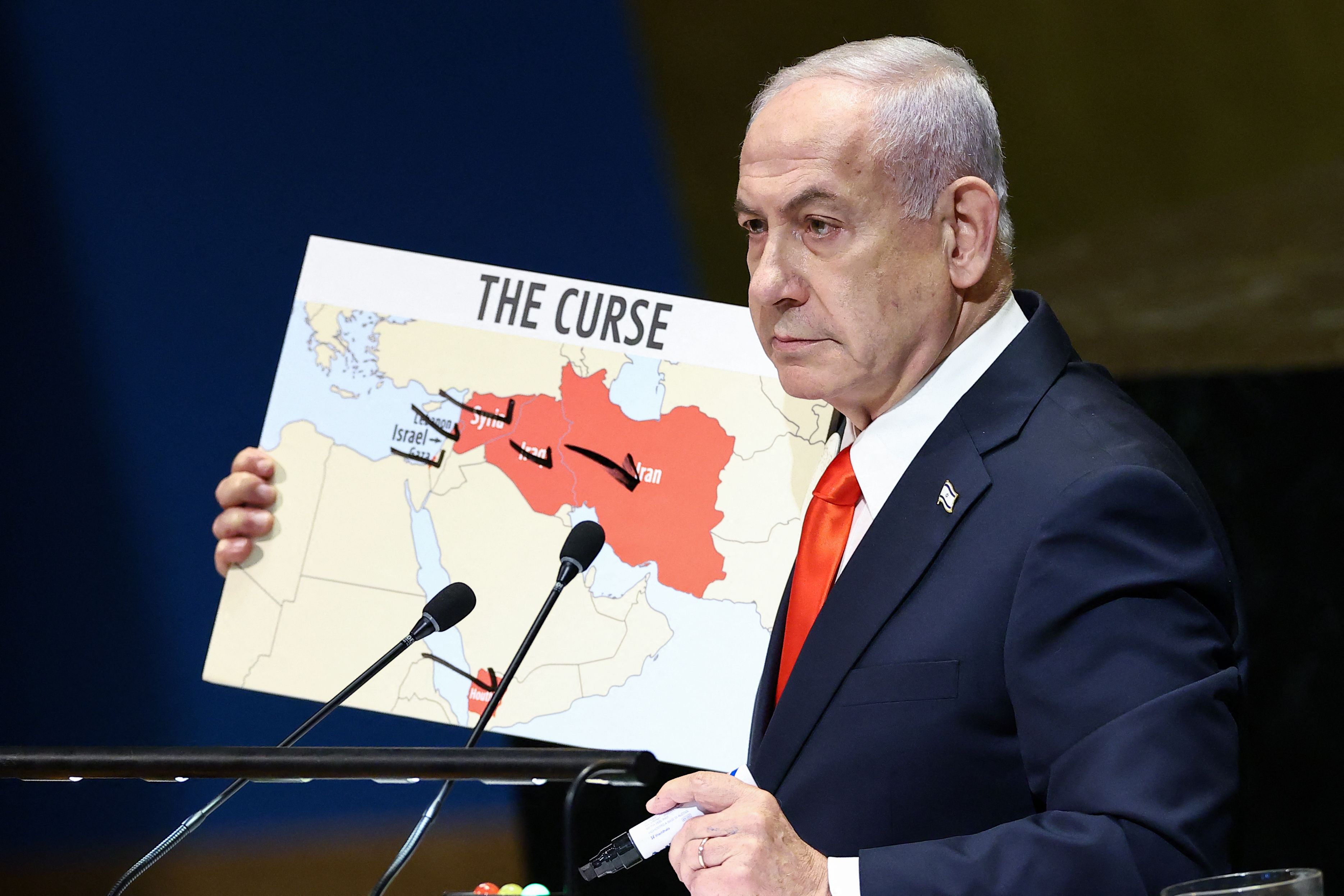  - Israeli Prime Minister Benjamin Netanyahu holds a map as he speaks during the General Debate of the United Nations General Assembly at UN headquarters in New York City on September 26, 2025. (Photo by CHARLY TRIBALLEAU / AFP) (Photo by CHARLY TRIBALLEAU/AFP via Getty Images)