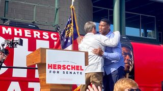 Brian kemp hugs Herschel Walker
