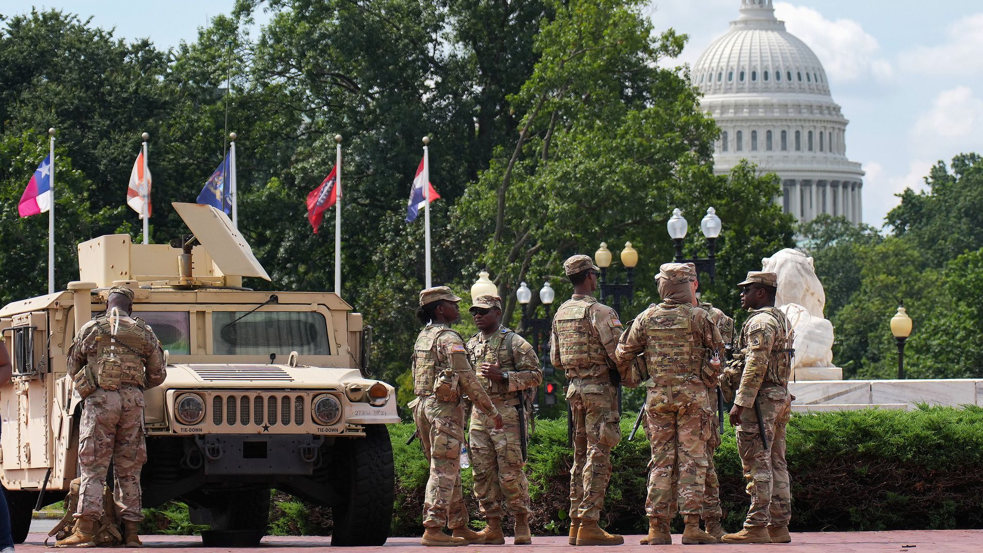 Members of the National Guard stand in full uniform at Union Station on August 14, 2025 in Washington, DC. 