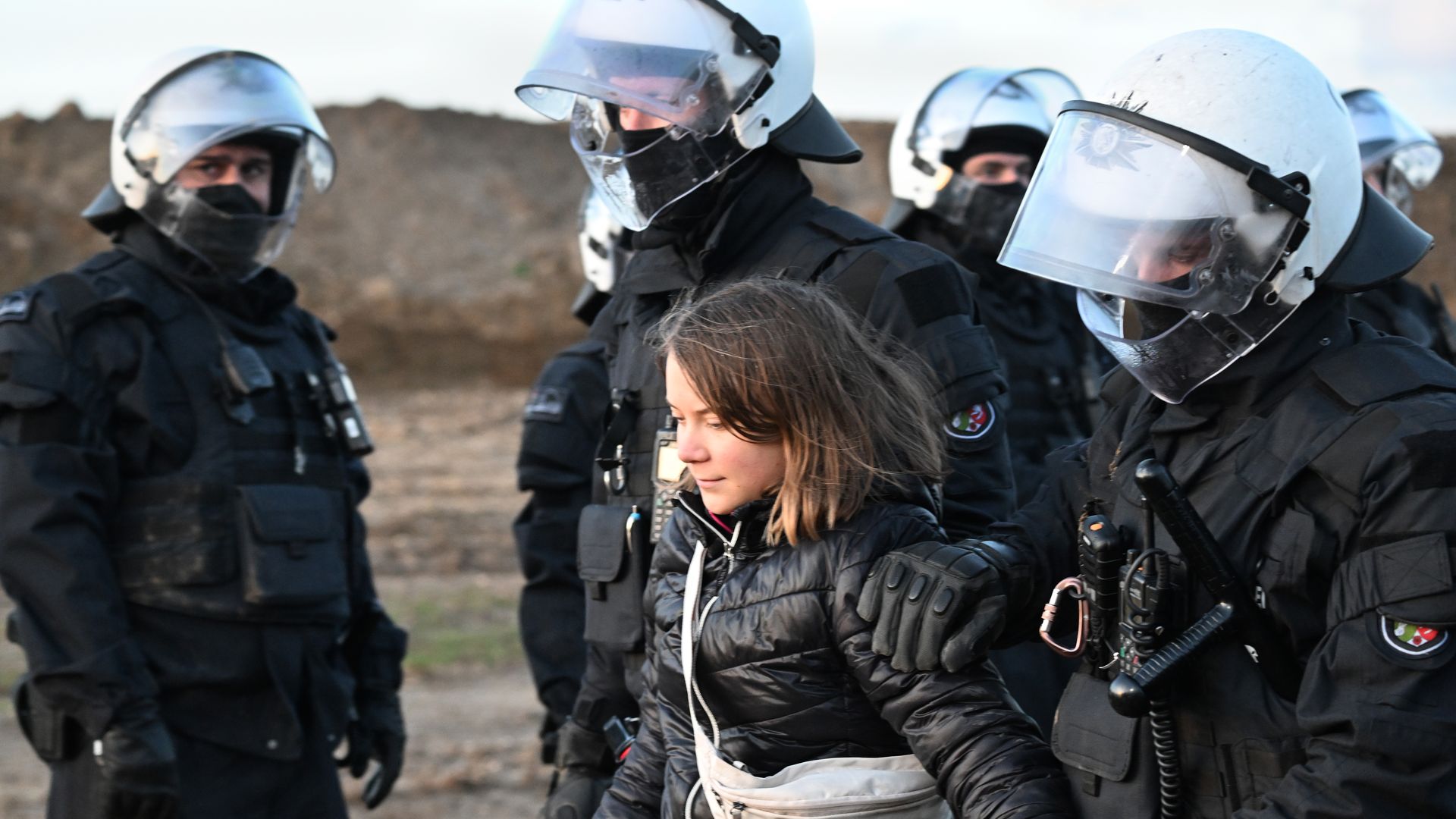 Greta Thunberg escorted by police