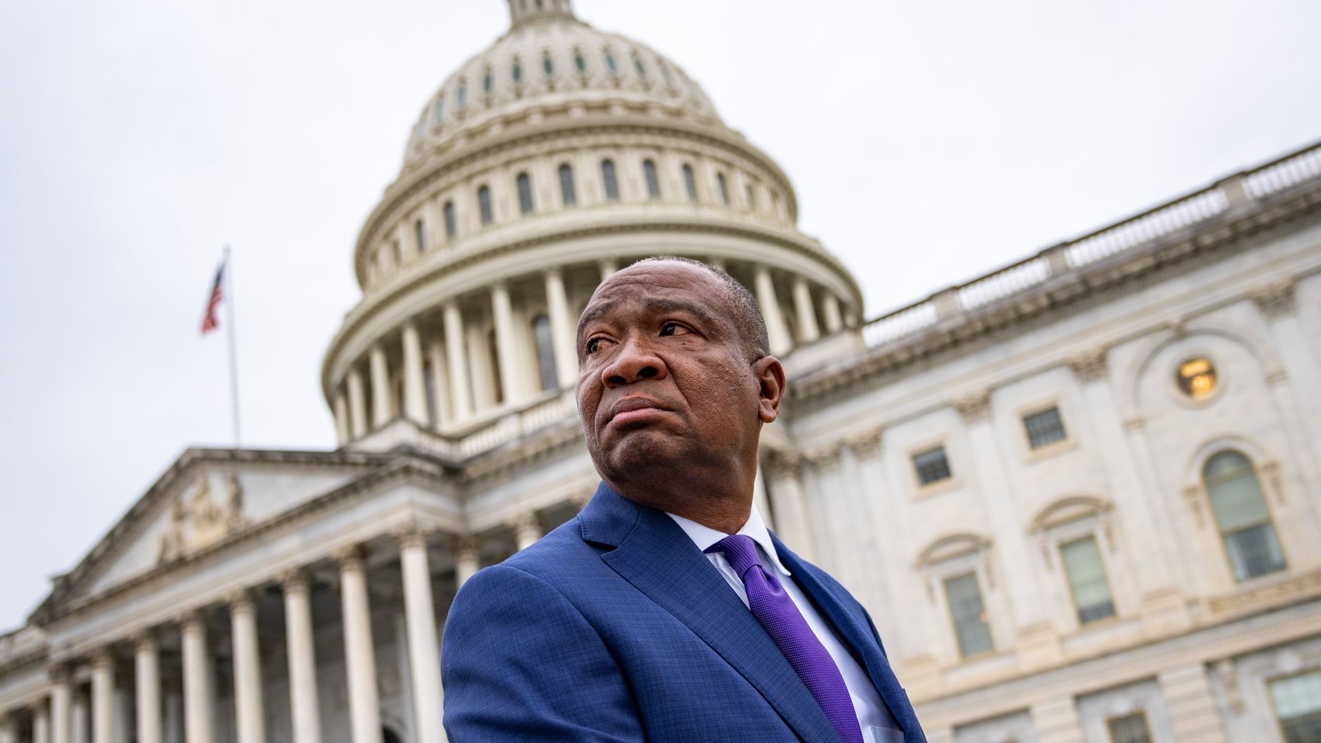 Cleo Fields looks over his shoulder with the US Capitol in the background.