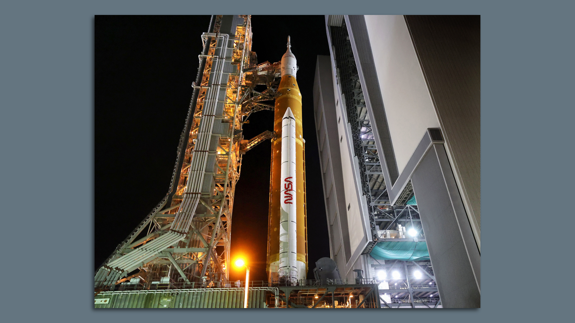 Artemis I leaves the Vehicle Assembly Building as it rolls out to launch pad 39-B at Kennedy Space Center in Florida on Tuesday, Aug. 16, 2022.