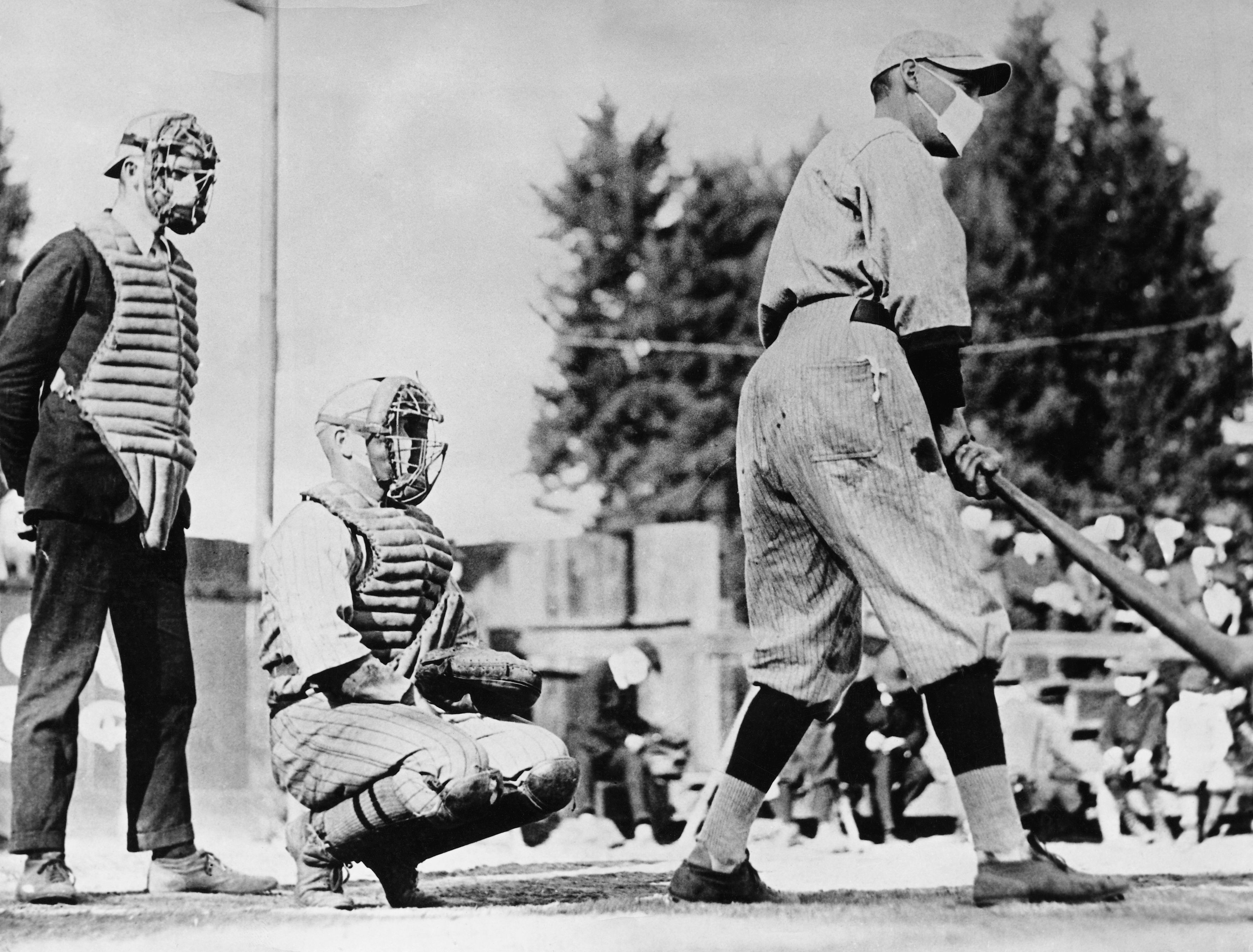 Baseball player wearing a mask