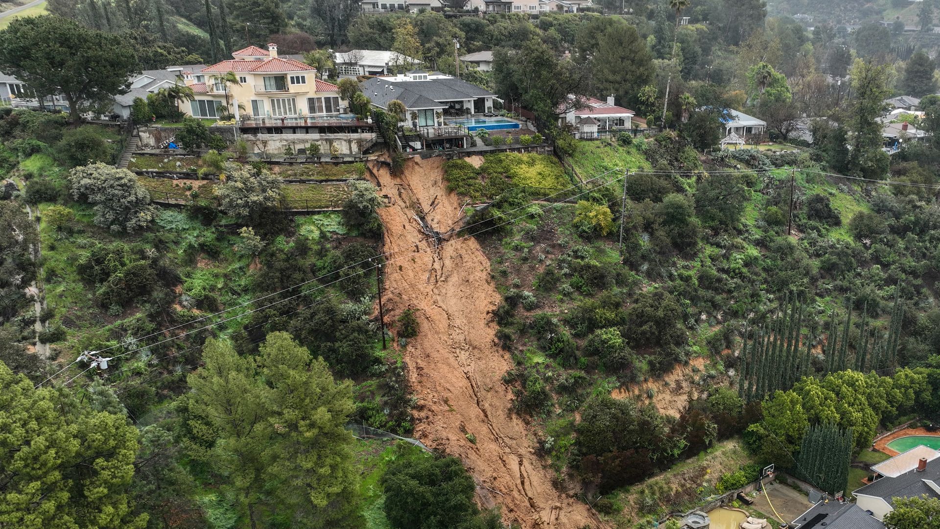 Homes in La Cañada Flintridge in Los Angeles County on Monday that were damaged in a mudslide that crashed down onto the properties following relentless rain. 