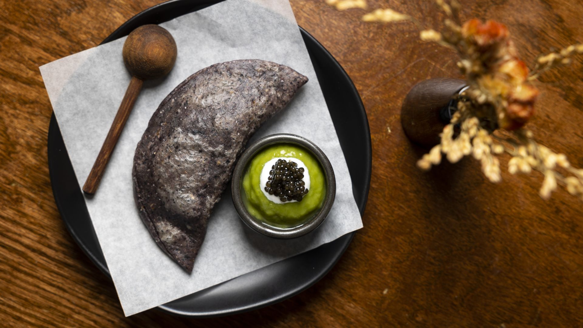 Photo of a  fried quesadilla featuring caviar 