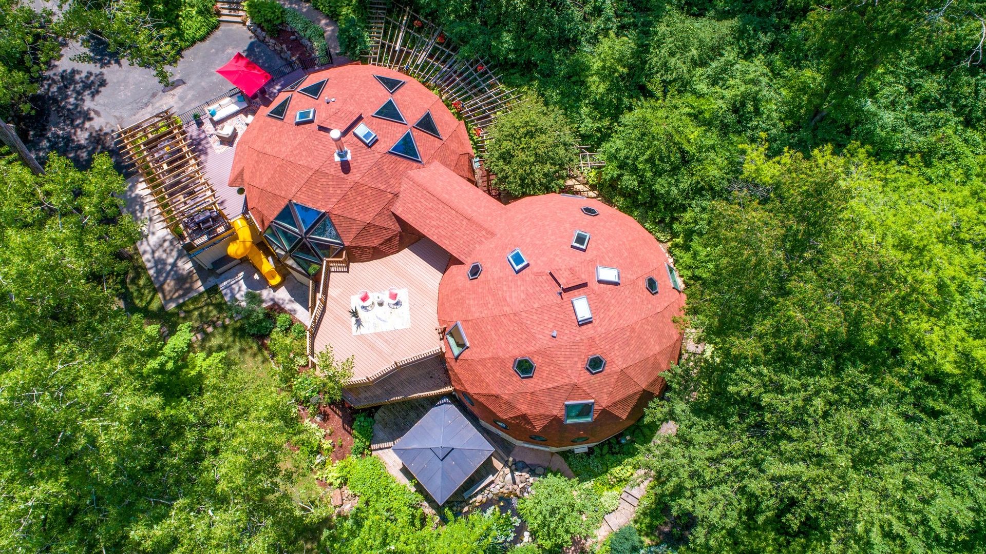 above view of two connected geodesic dome homes