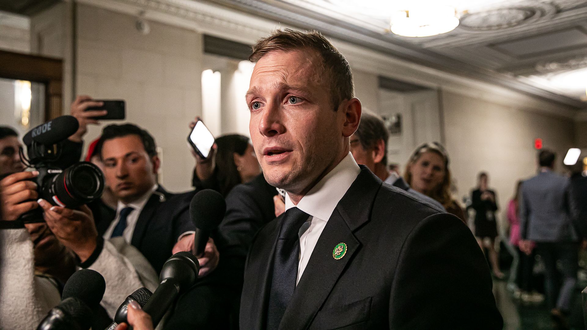 Rep. Max Miller speaks to reporters.