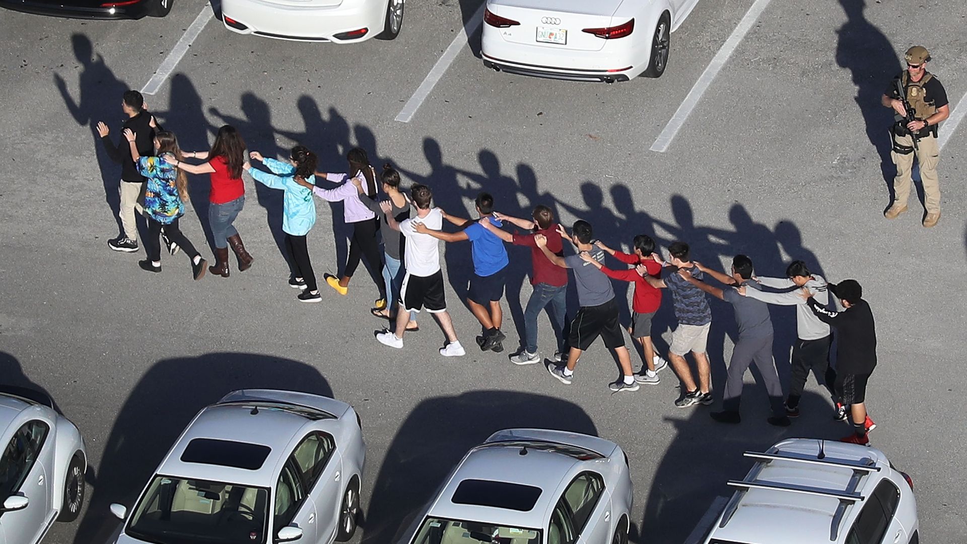 Students evacuate from the shooting
