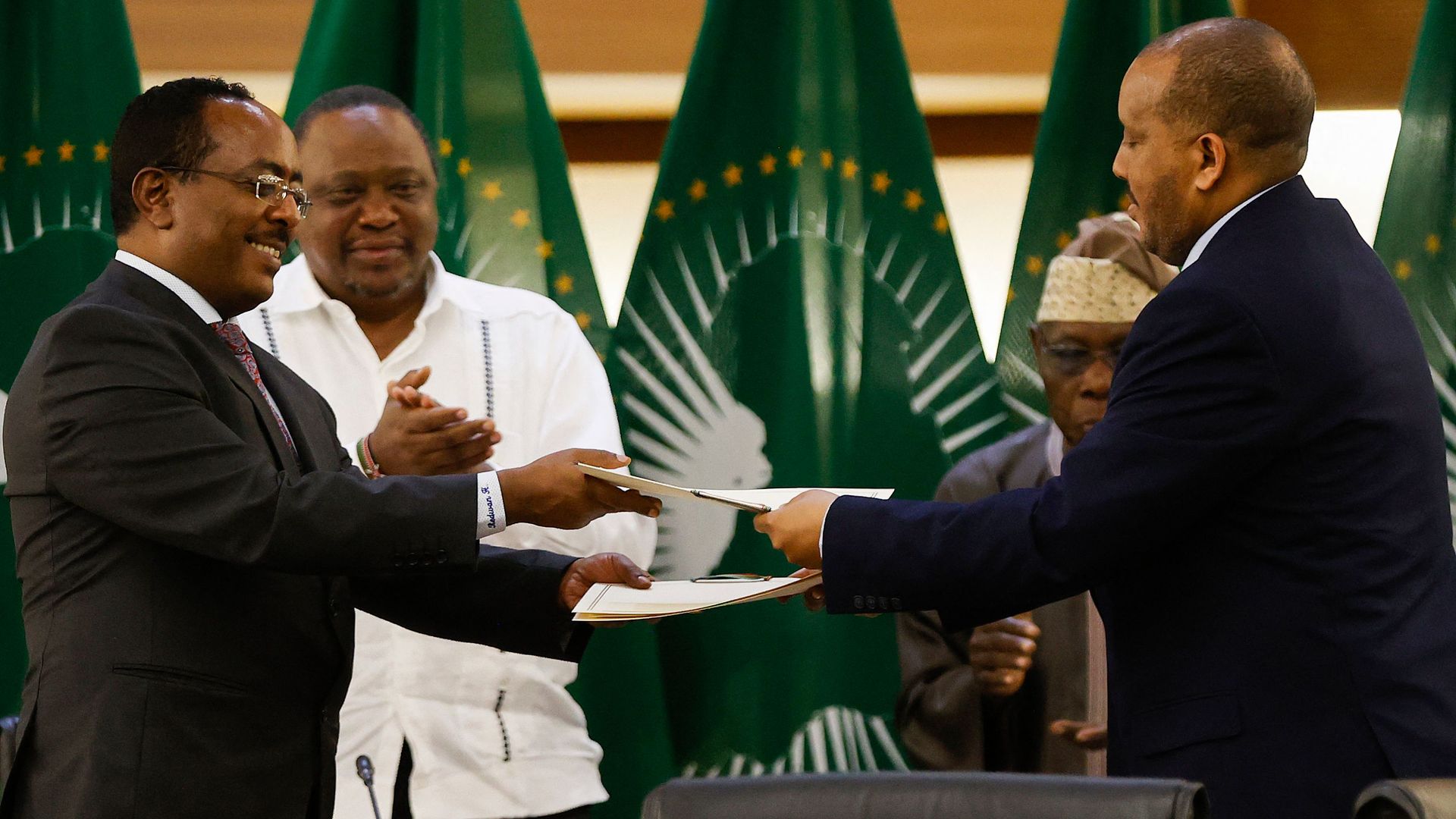 Redwan Hussien Rameto (L), Representative of the Ethiopian government, and Getachew Reda (R), 