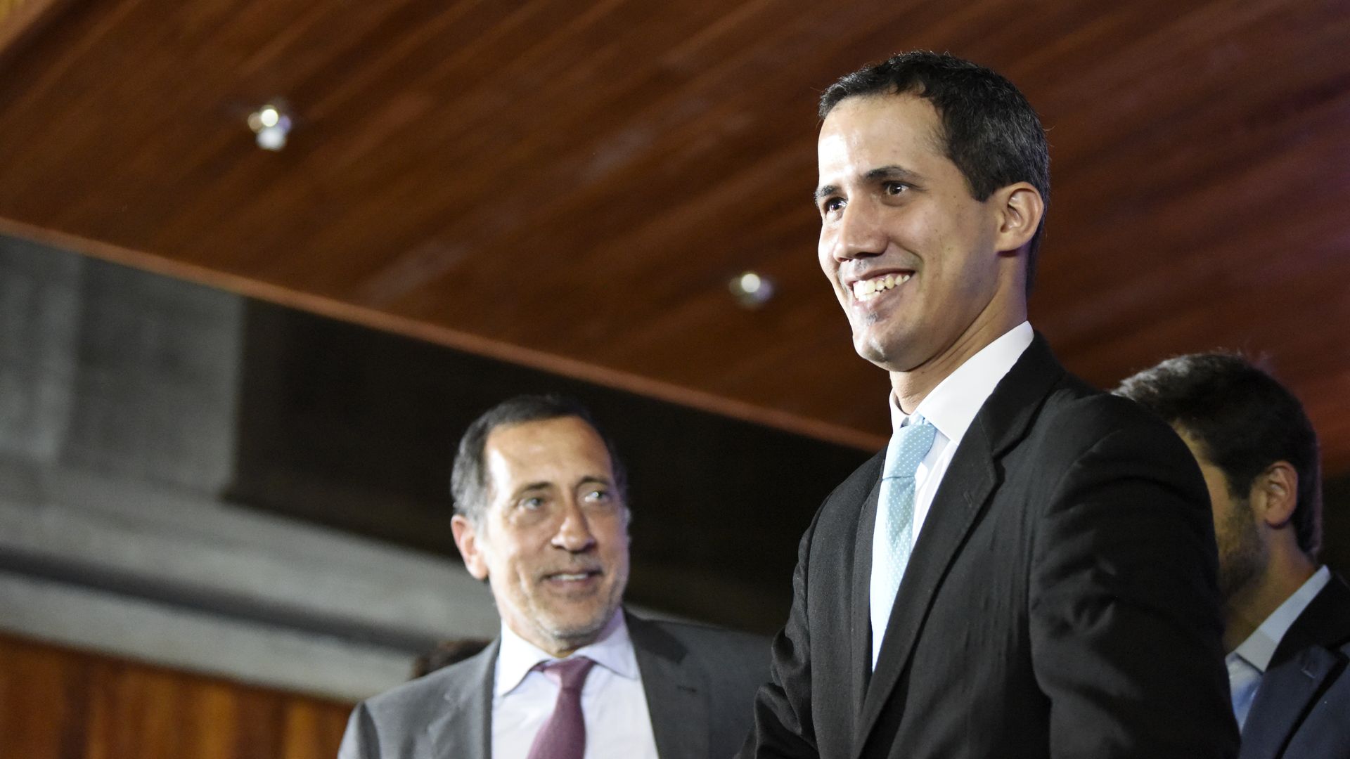 Juan Guaido smiles.