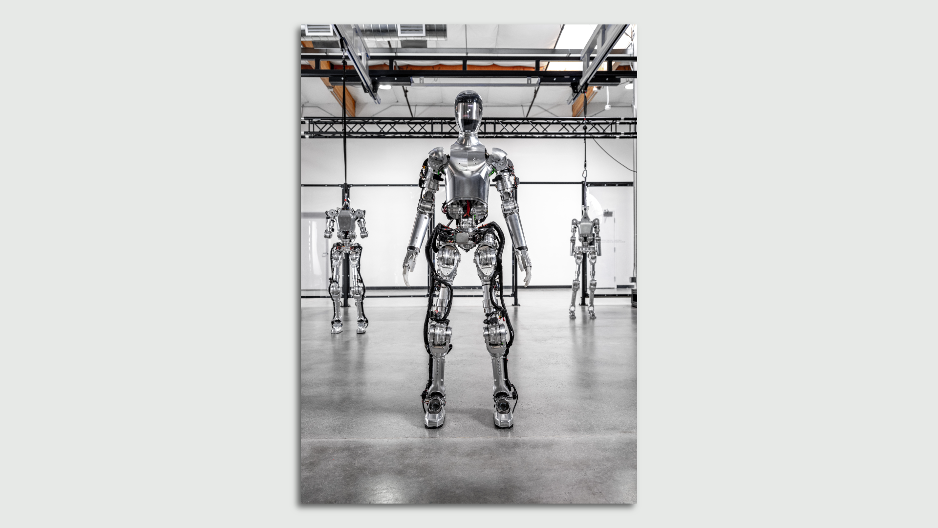 Figure robots stand at attention at the Figure factory. Photo courtesy of Figure.