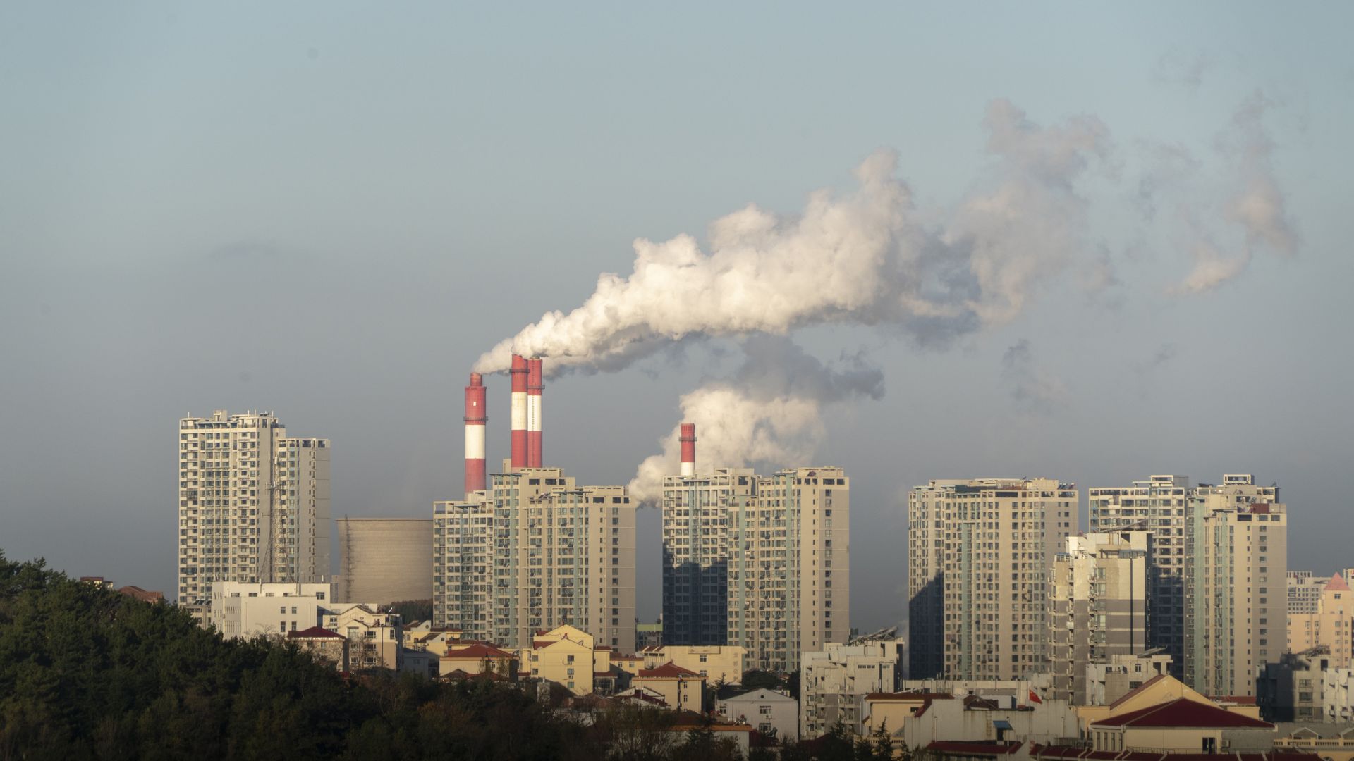 Smoke coming out of a factory chimney.