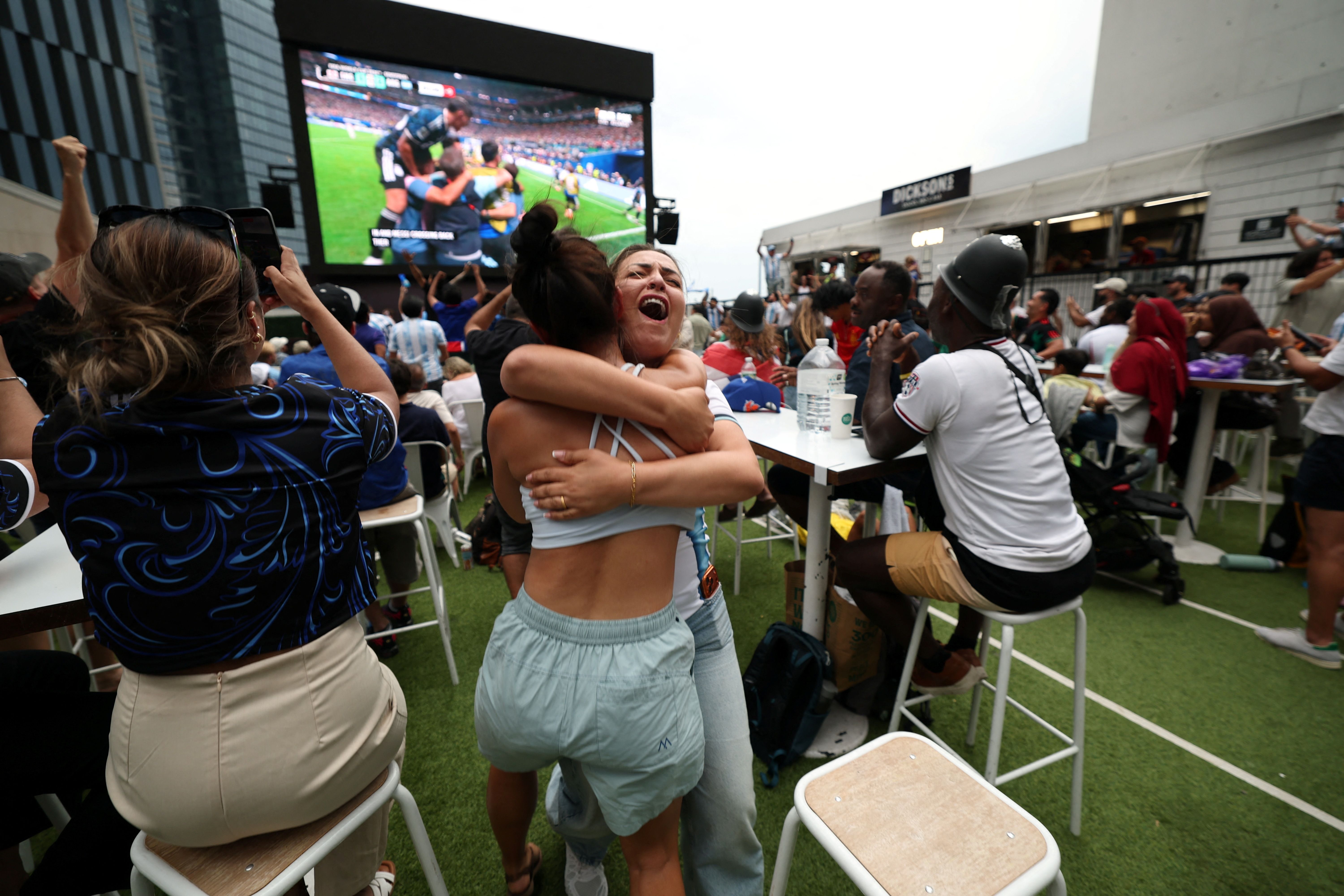Argentina fans celebrate their team's victory in 2026 World Cup semi-final match between England and Argentina in Miami Beach, Florida, on July 15, 2026. (Photo by TIMOTHY A. CLARY / AFP via Getty Images)