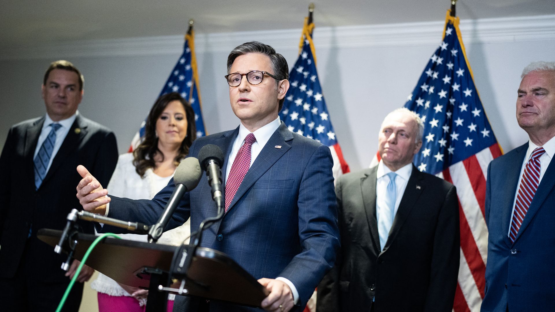 Speaker of the House Mike Johnson (C), Republican of Louisiana, speaks during a news conference at the Republican National Committee after House Republicans held a meeting with former US President and Republican presidential candidate Donald Trump on June 13, 2024 in Washington, DC. Trump enjoyed an