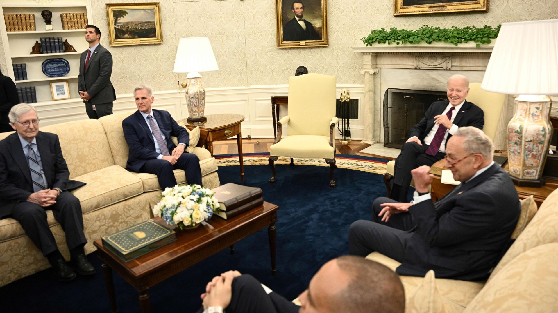 Five men seated at the White House