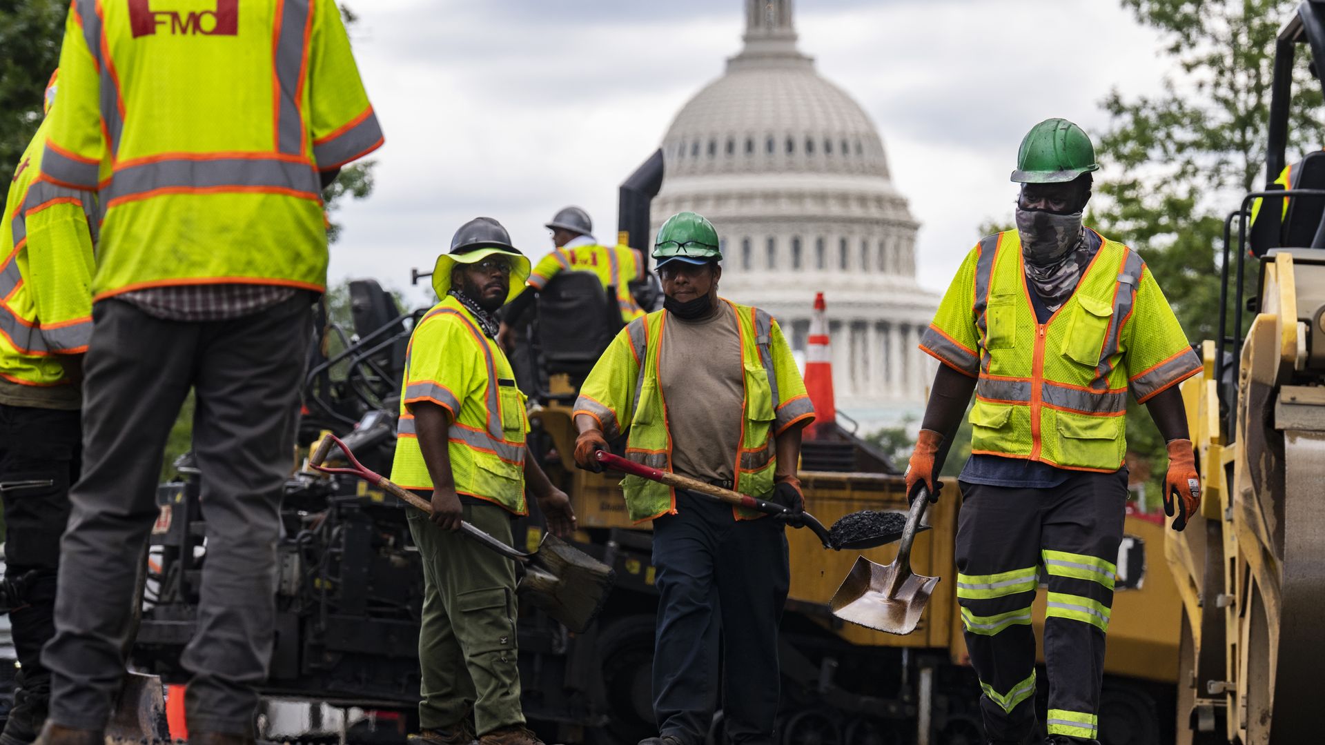 Road crews for Fort Myer Construction work on the street