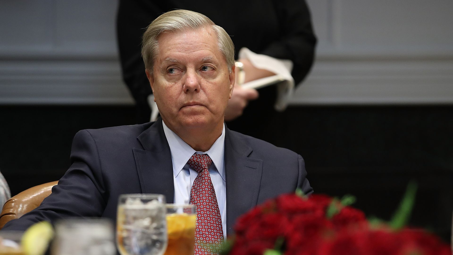 Lindsey Graham looks mad, looks sideways out his eyes