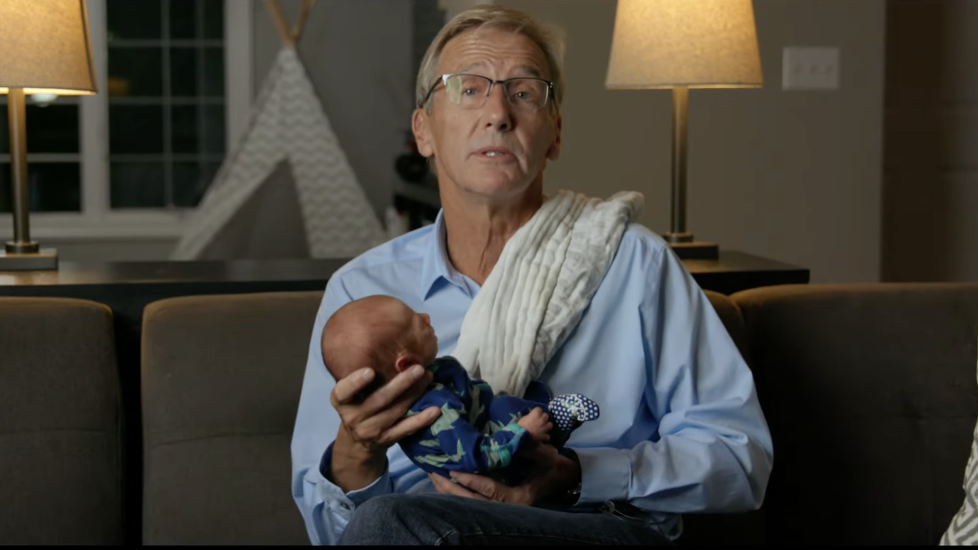 scott jensen ad holding a baby