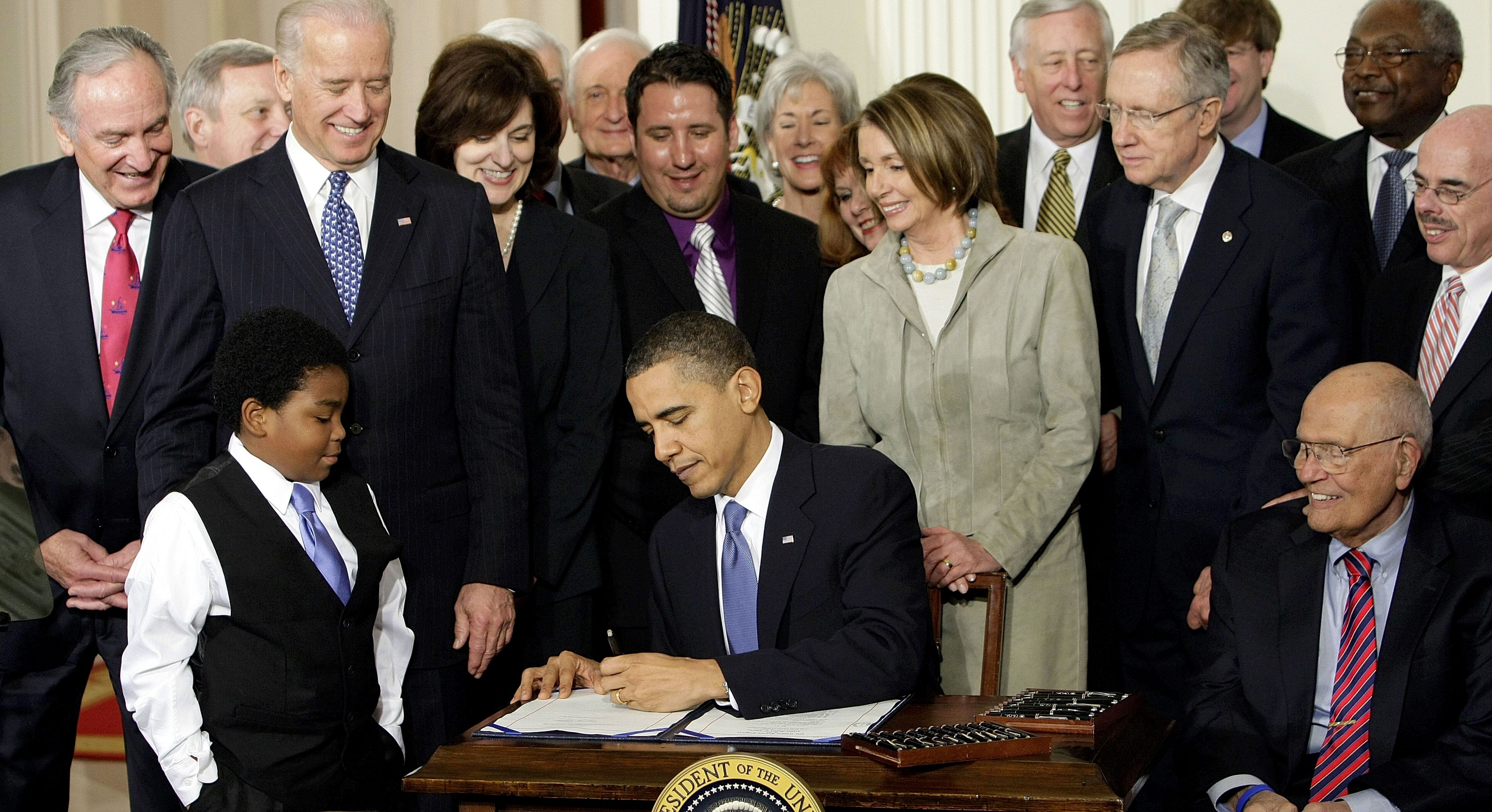 Obama signing Affordable Care Act