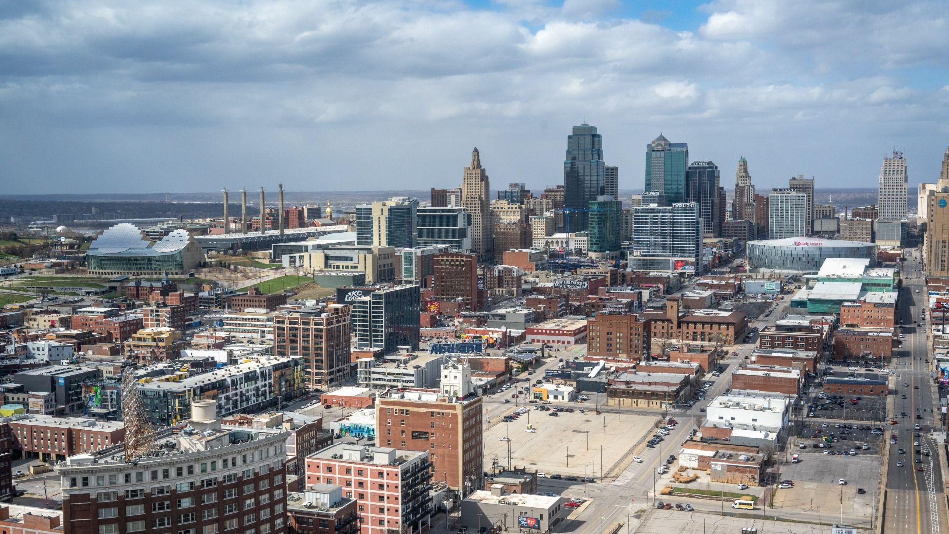 Aerial photo of the downtown Kansas City skyline, including the Western Auto Building, Kauffman Center, and One Kansas City Place, looking northwest from the area of Crown Center.