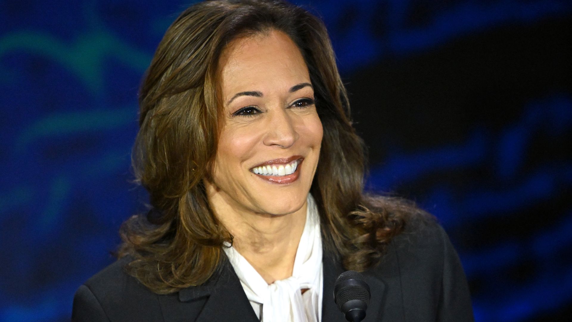 Kamala Harris smiles during a presidential debate with former US President and Republican presidential candidate Donald Trump at the National Constitution Center in Philadelphia, Pennsylvania, on September 10