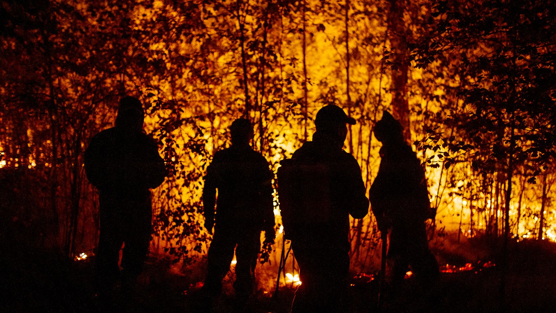 Firefighters battle a blaze in Sakha, Russia in August 2021. 