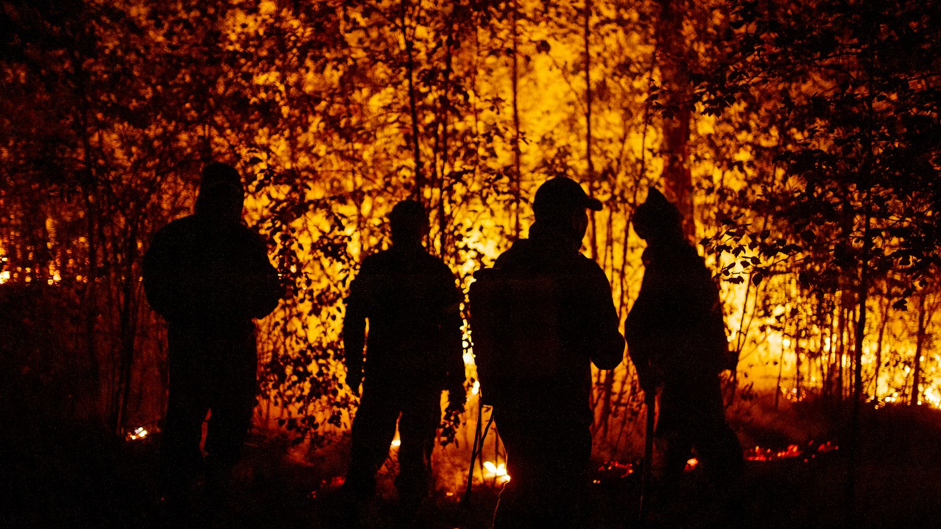 Firefighters battle a blaze in Sakha, Russia in August 2021.