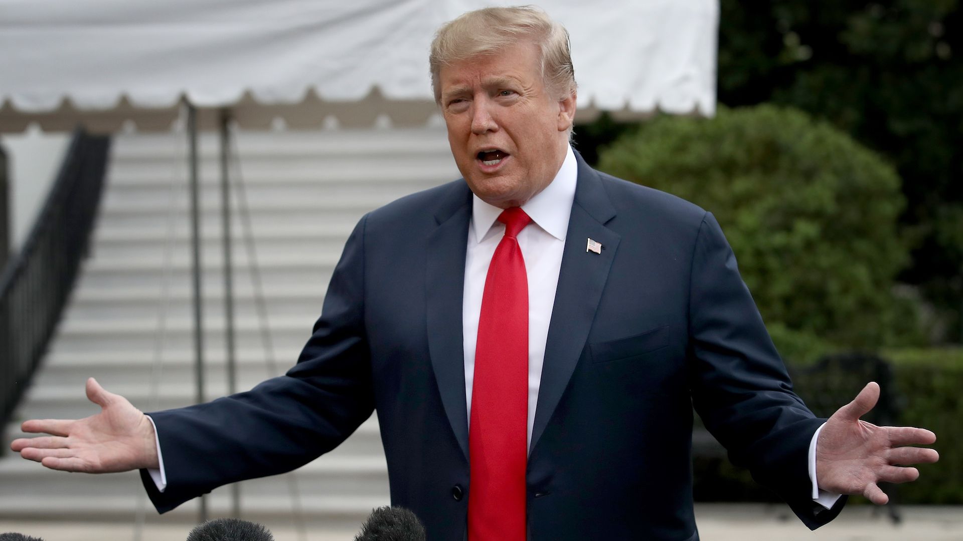 President Donald Trump speaks to reporters before boarding Marine One.