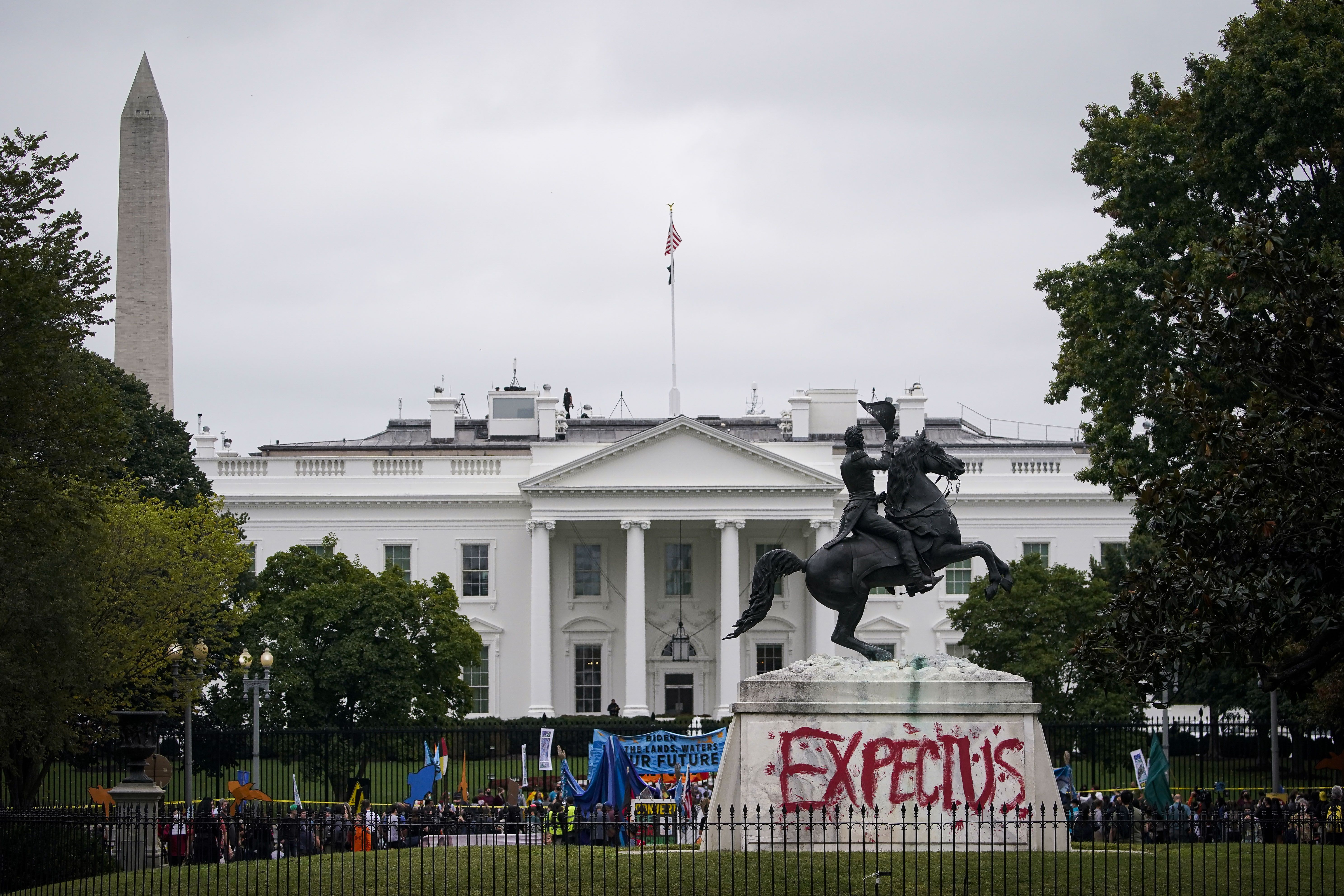 "Expect Us" painted on a statue of U.S. President Andrew Jackson outside the White House