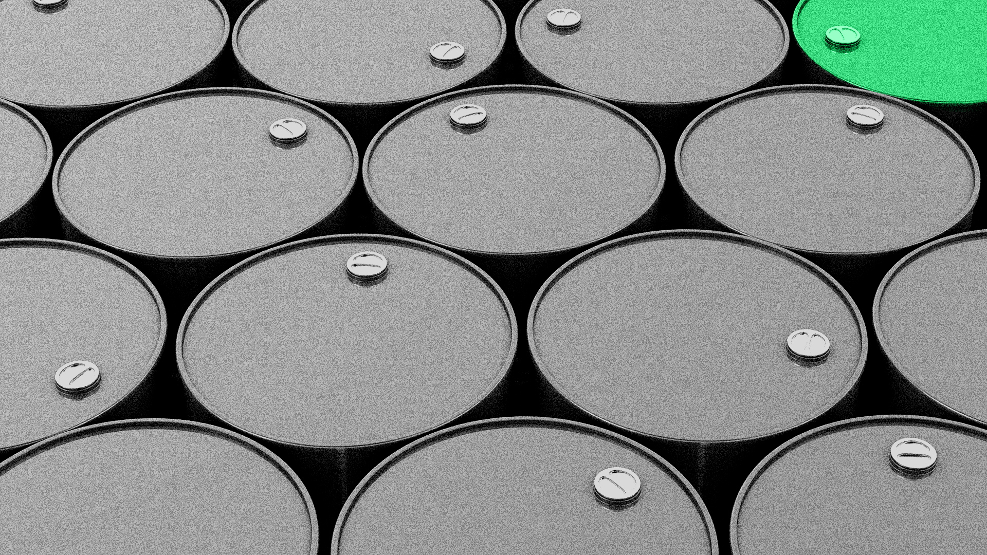 Group of black oil barrels with one green one