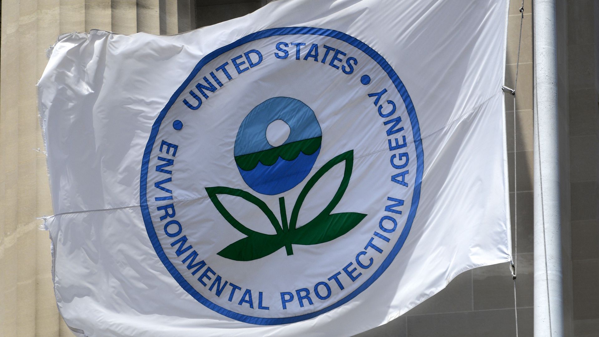 In this image, the EPA logo is seen on a flag