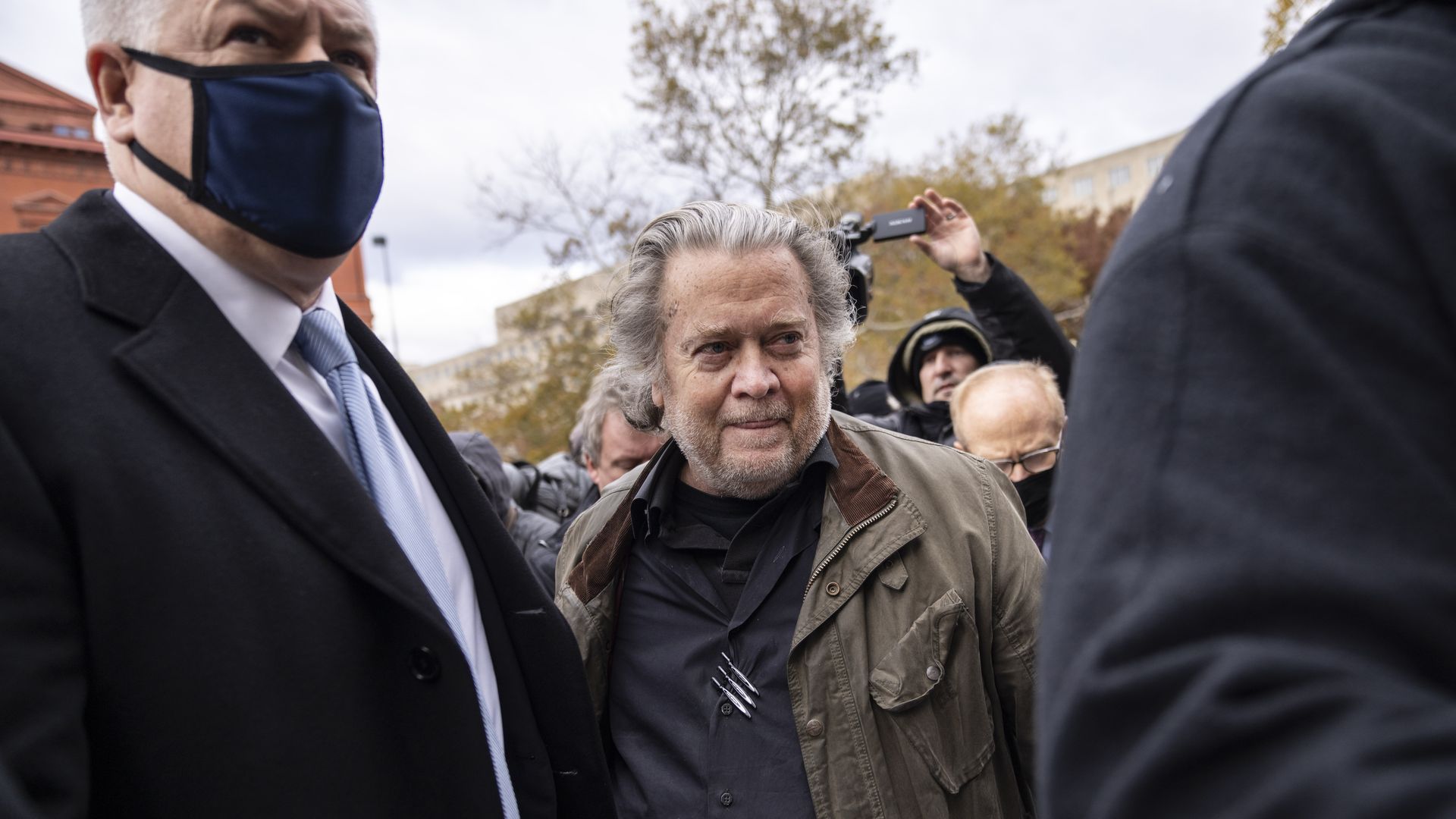 Steve Bannon arrives to turn himself in at the FBI Washington Field Office on November 15