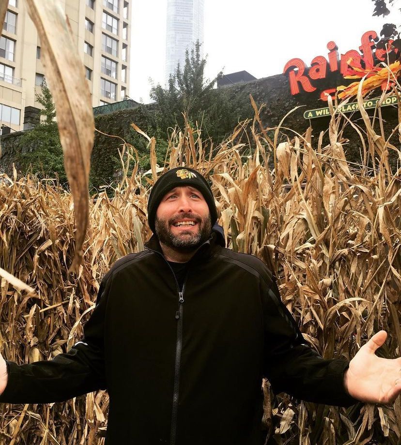Photo of a man in a corn maze 