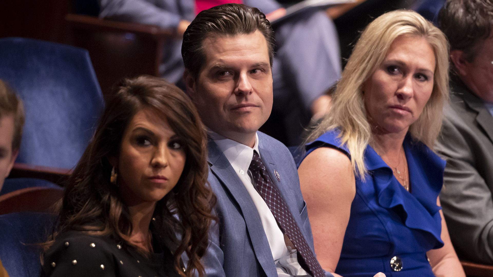 Reps. Lauren Boebert, Matt Gaetz and Marjorie Taylor Green are seen sitting next to each during a congressional hearing.