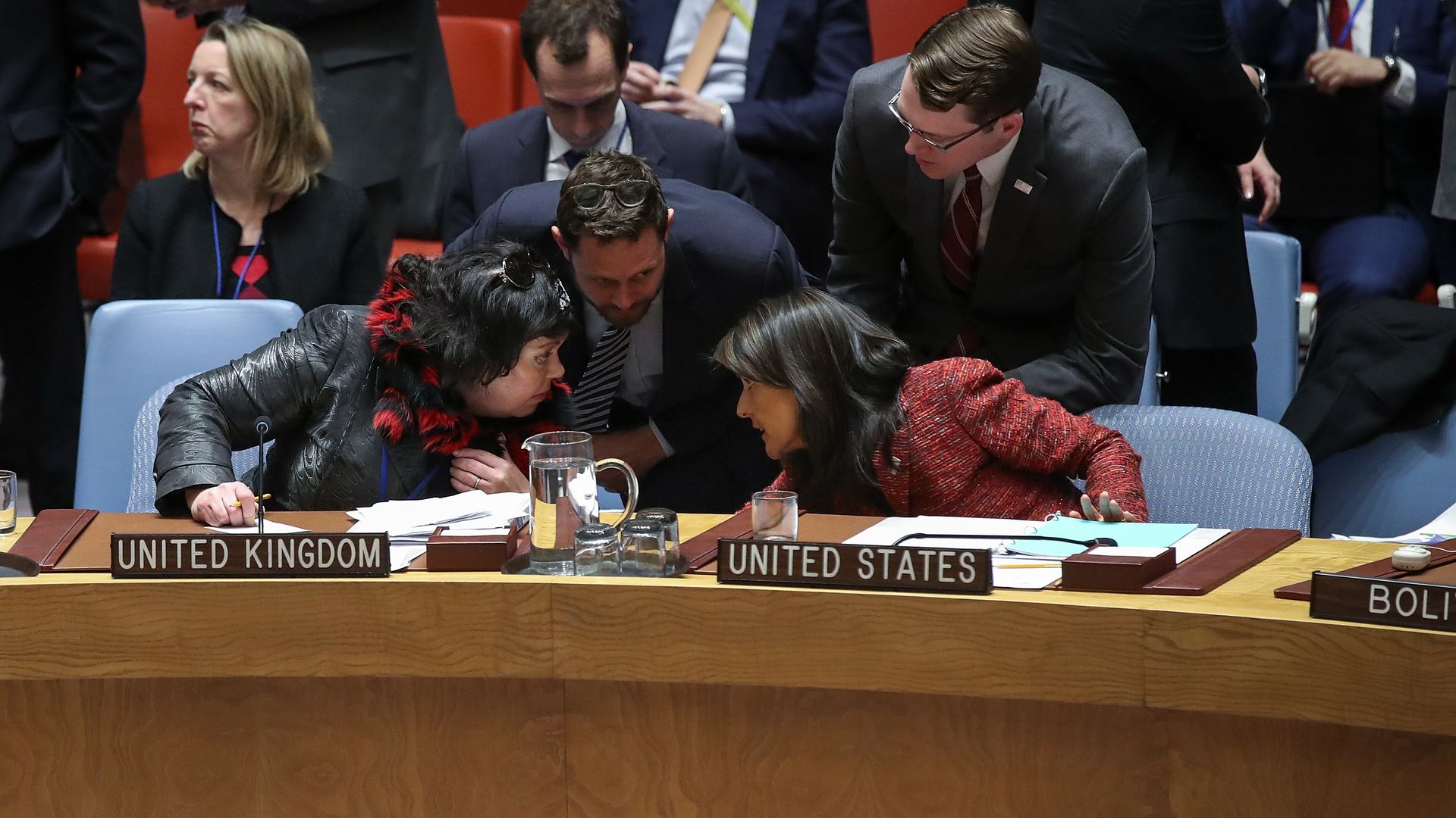 UN ambassadors from the U.K. (Karen Pierce) and U.S. (Nikky Haley) talk during a Security Council meeting