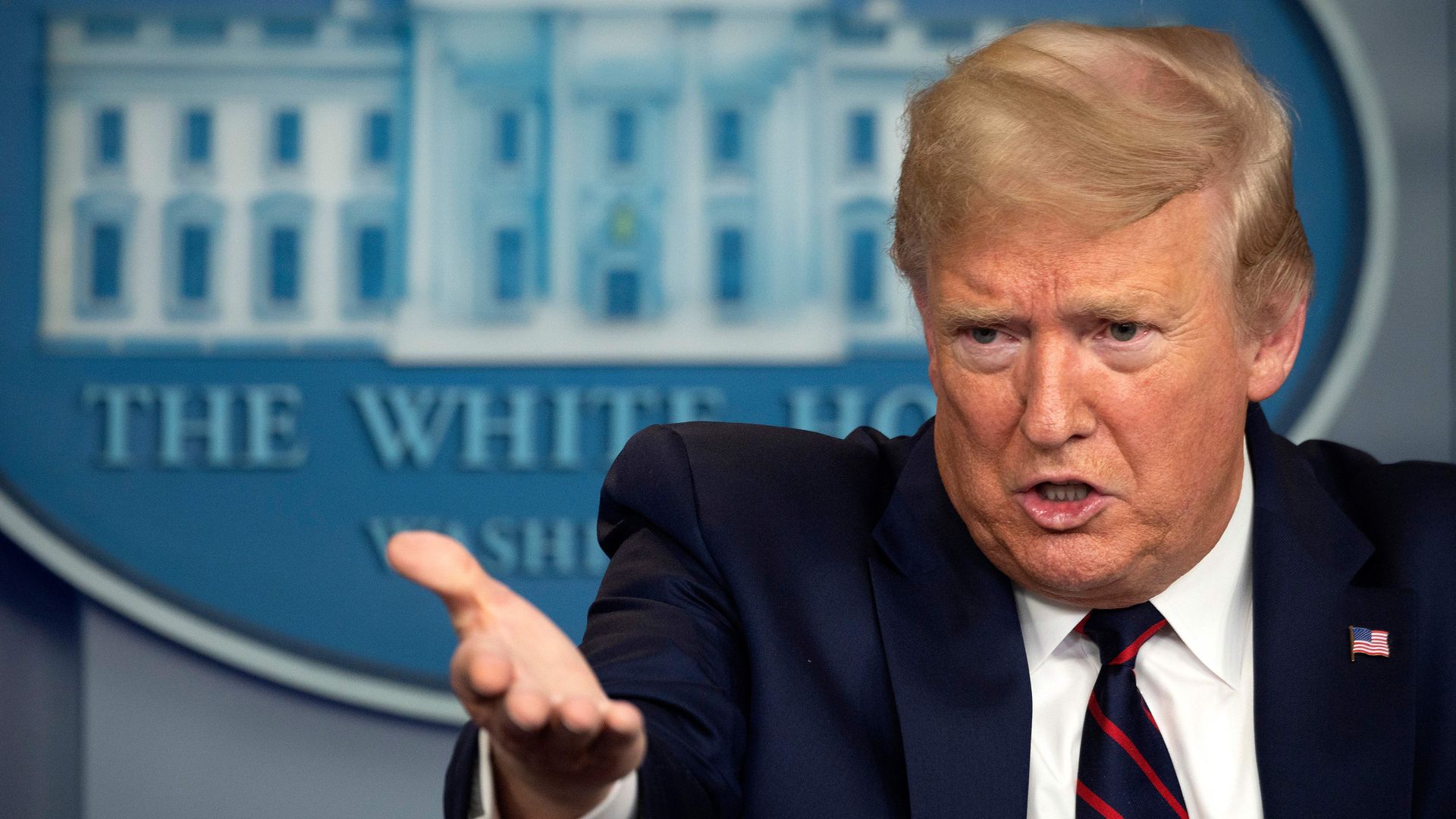 In this image, Trump speaks at the White House