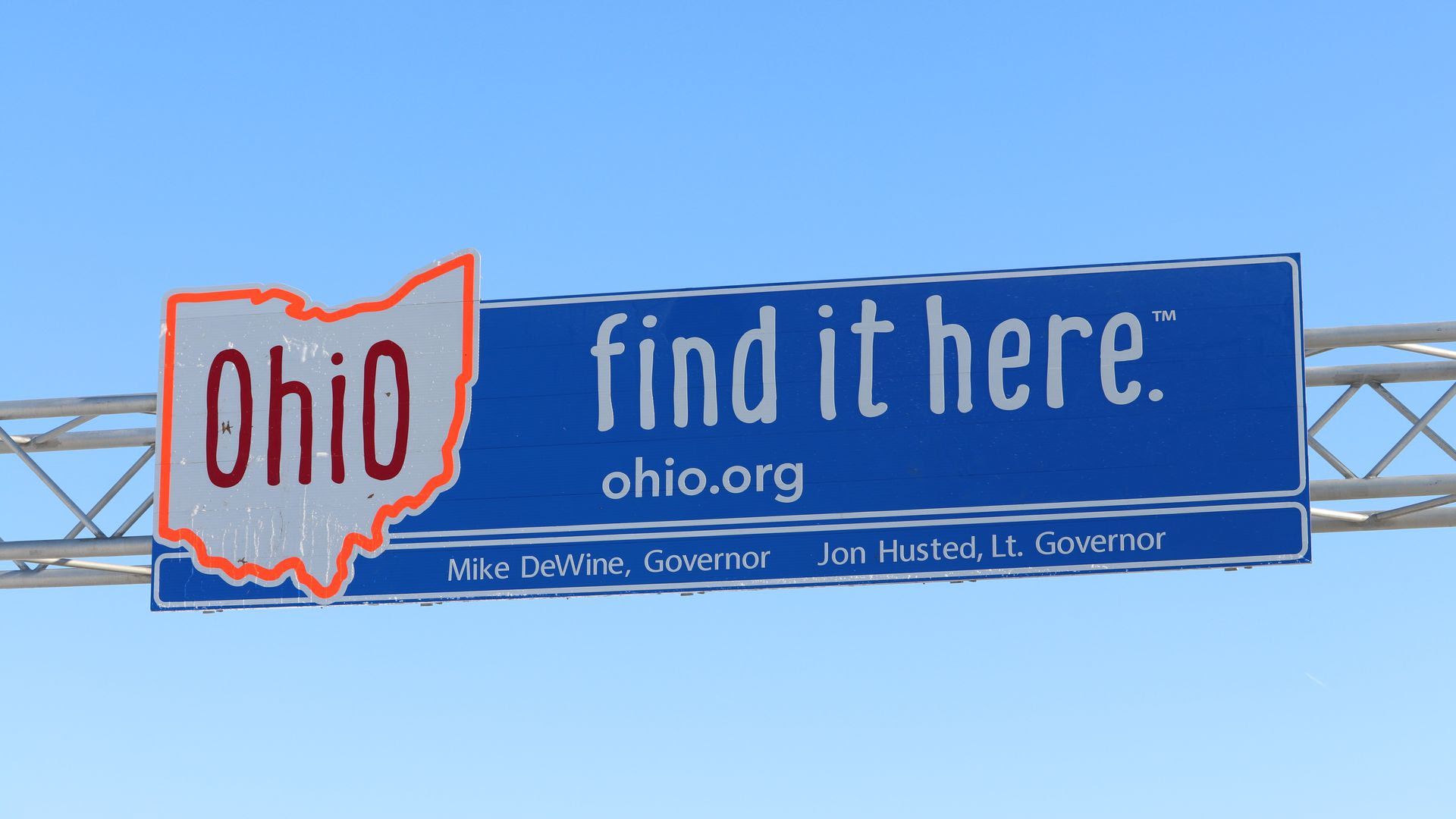 A state welcome sign for Ohio reading: "find it here."