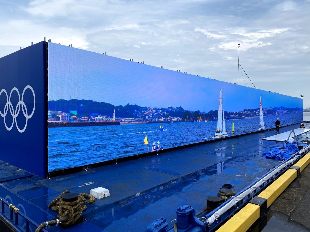 A 50-meter-wide display brings the sailing action closer to those watching from land.