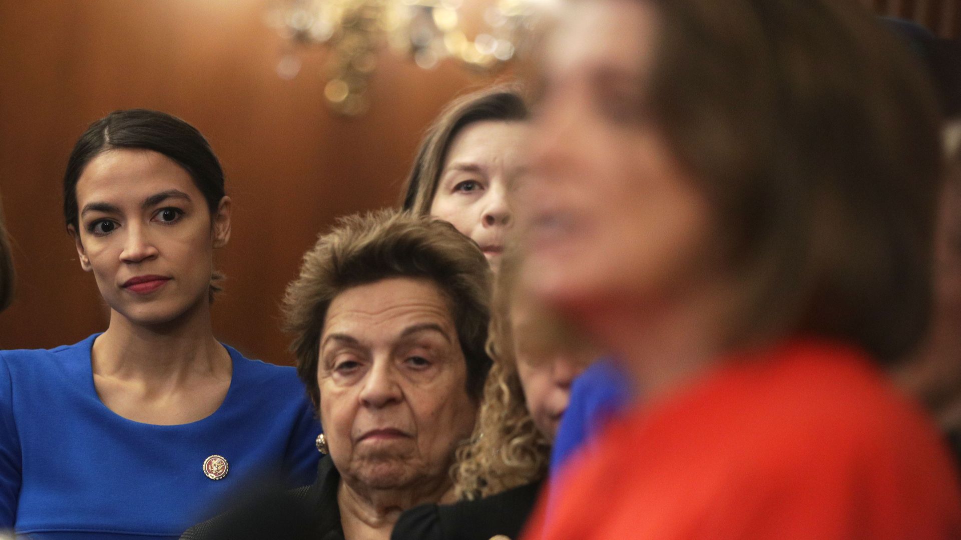 U.S. Rep. Kathy Castor (D-FL), Rep. Alexandria Ocasio-Cortez (D-NY), and Rep. Donna Shalala (D-FL) listen as Speaker of the House Rep. Nancy Pelosi (D-CA) speak.
