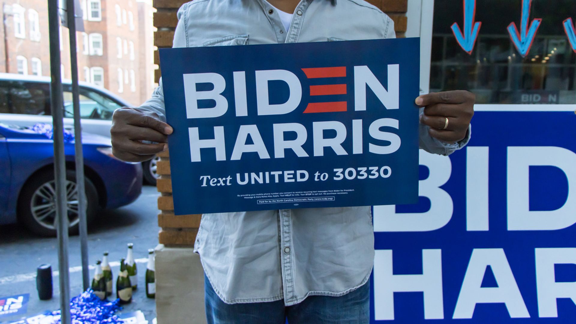 Biden Harris sign outside headquarters