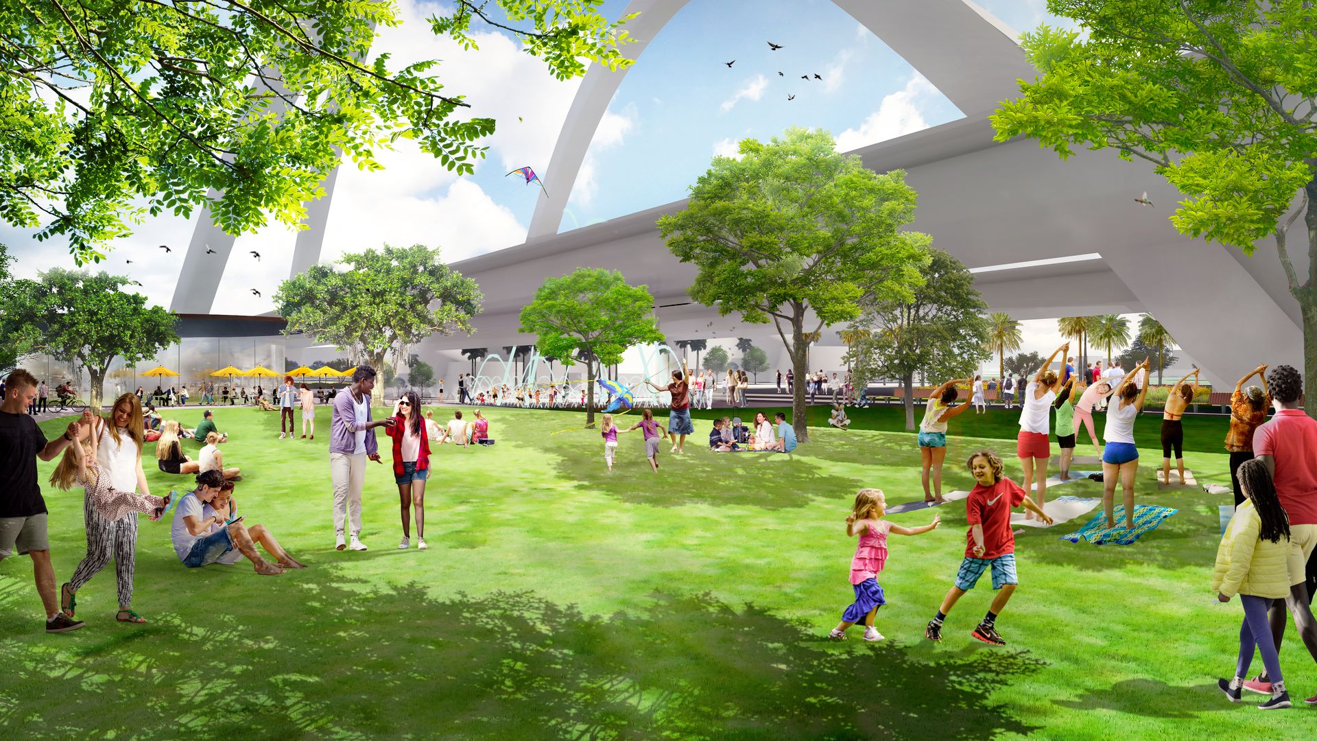 People enjoying a sunny day in a green park with large white arches overhead, trees, fountains, children flying kites, and a group doing yoga on mats.