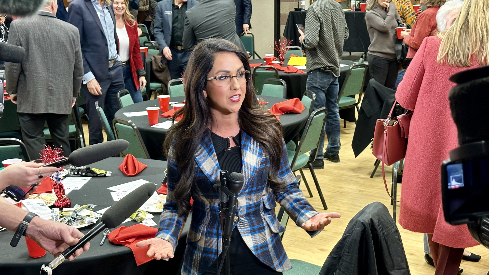 Lauren Boebert takes questions after the Thursday debate in Fort Lupton. Photo: John Frank/Axios