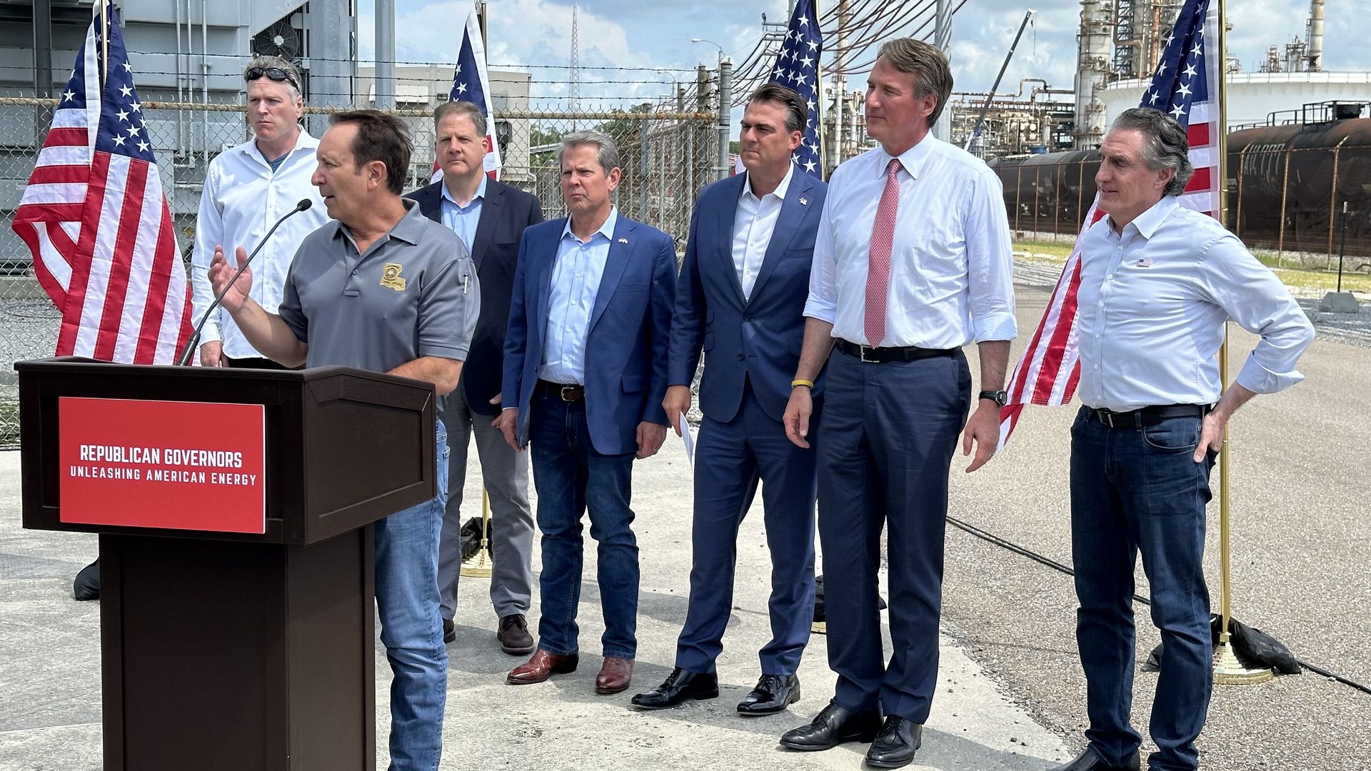Gov. Jeff Landry stands at a podium flanked by six other Republican governors.