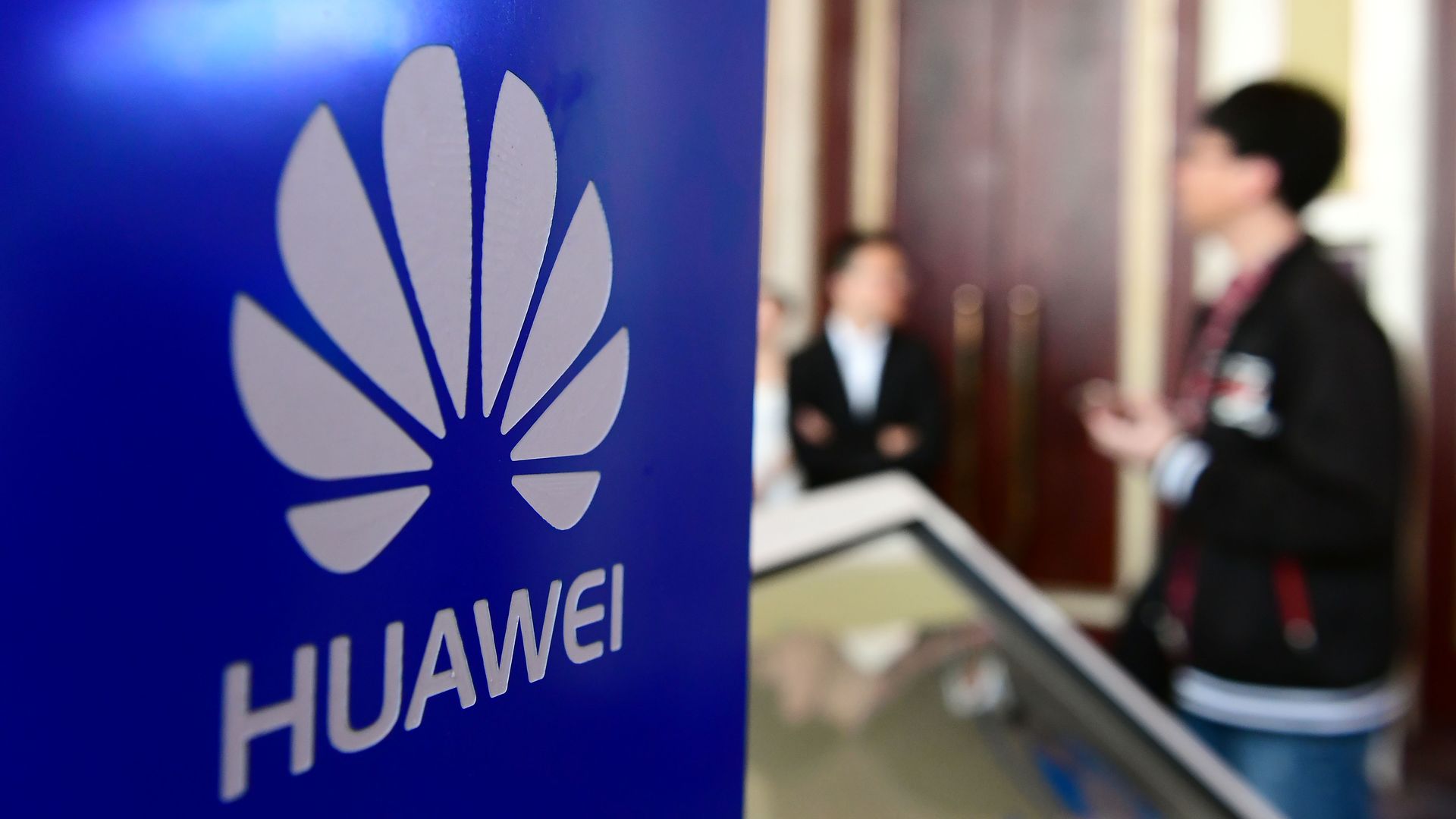 A sign with the Huawei logo