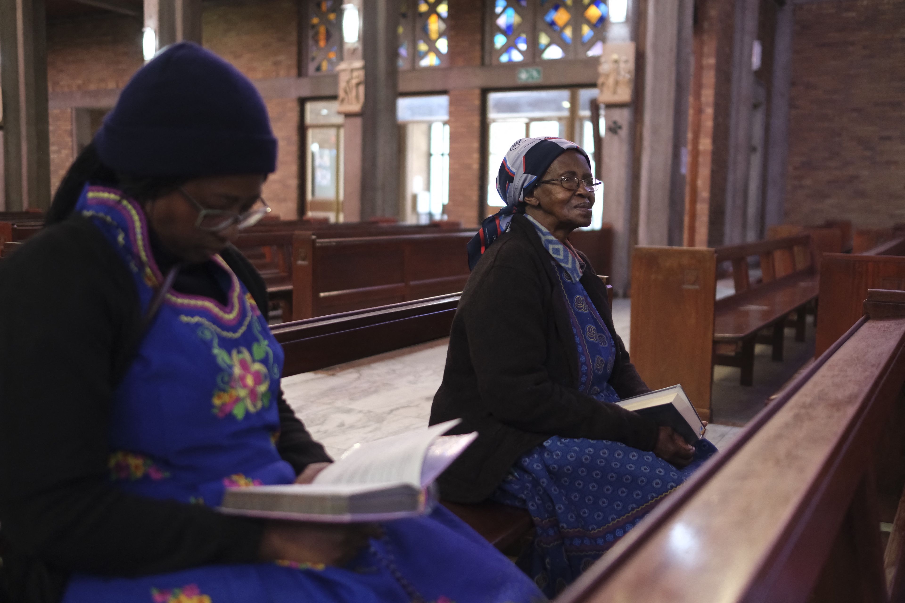 People sit in a church 