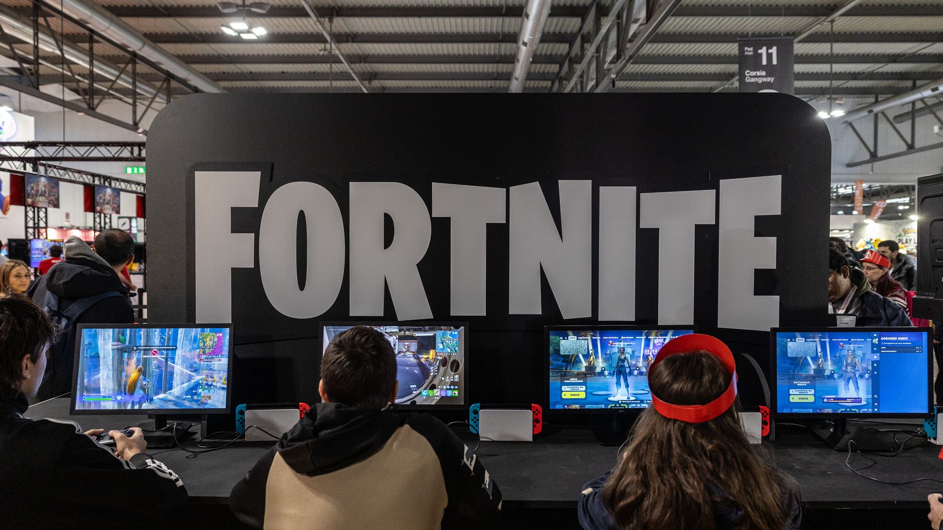 MILAN, ITALY - NOVEMBER 22: Fairgoers play video games at the Japanese publisher Nintendo Switch's stand during Milan Games Week & Cartoomics 2024 at Fiera Milano Rho on November 22, 2024 in Milan, Italy. Milan Games Week is the most important video games festival in Italy, featuring the latest news