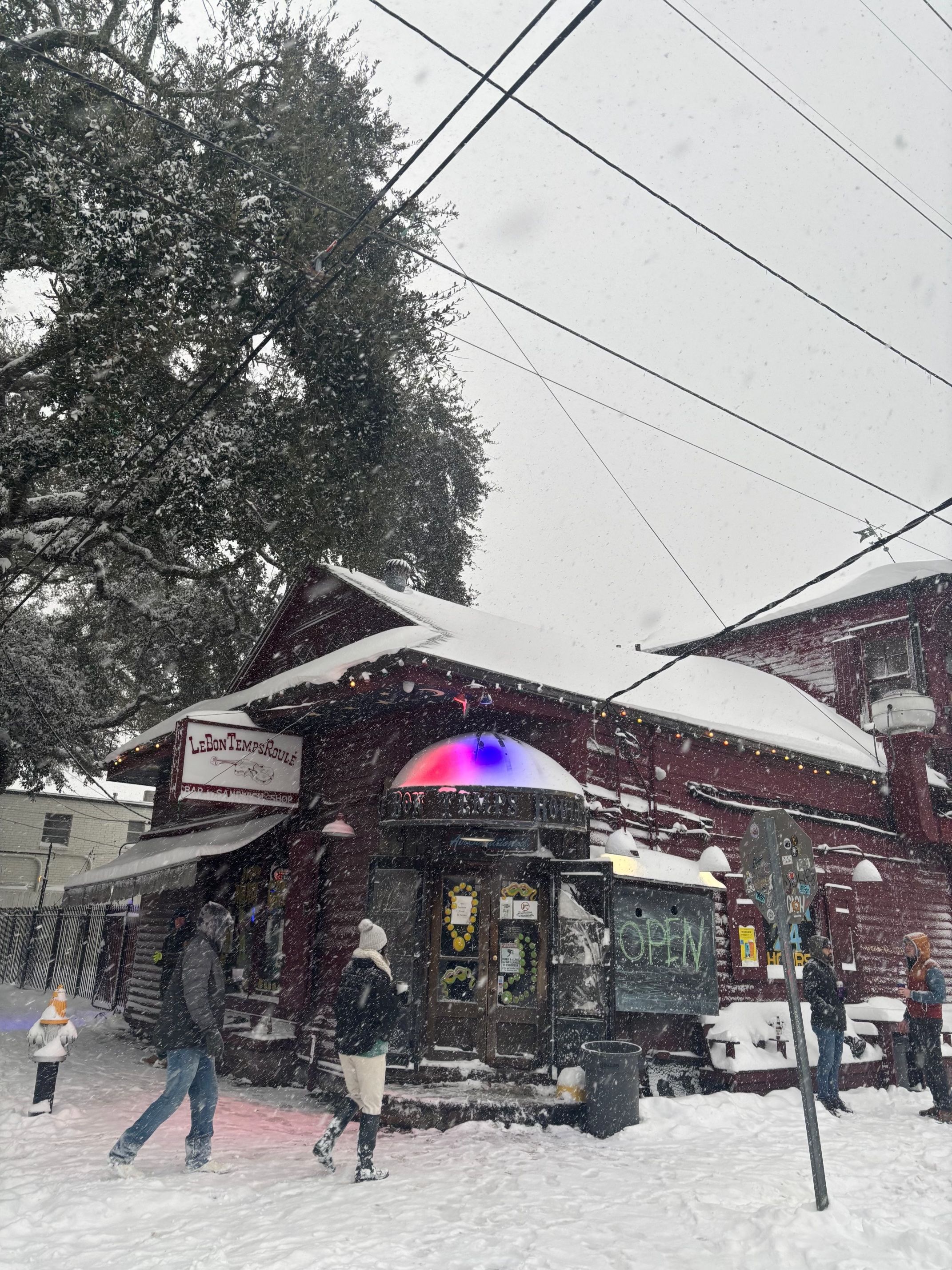 Photo shows Le Bon Tempe Roule bar covered in snow.